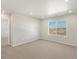 Simple bedroom with carpeted floors and window at 1925 S Coolidge Way, Aurora, CO 80018