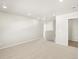 Upstairs hallway with carpeted floors and access to bedrooms at 1925 S Coolidge Way, Aurora, CO 80018