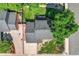 This aerial view showcases the home's roof and landscaping at 7486 S Washington St, Centennial, CO 80122