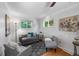 Cozy sitting area features hardwood floors, natural light, and neutral color palette at 7486 S Washington St, Centennial, CO 80122