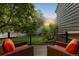 Relaxing deck area with comfortable seating overlooking a beautifully landscaped yard at 4505 S Yosemite St # 362, Denver, CO 80237