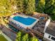 Community swimming pool with ample seating and a meticulously maintained surrounding area at 4505 S Yosemite St # 362, Denver, CO 80237
