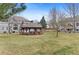Community gazebo in a well-maintained lawn area, surrounded by lush green grass at 11826 W Stanford Pl, Morrison, CO 80465