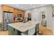 Modern kitchen with granite countertops, stainless steel appliances, and bar seating at 11826 W Stanford Pl, Morrison, CO 80465
