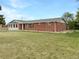 Charming single-story brick home with a well-maintained lawn and a welcoming front entrance at 12682 Anhawa Ave, Longmont, CO 80503