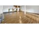 Open basement area with kitchenette offers flexible living space and includes essential appliances and cabinet space at 12682 Anhawa Ave, Longmont, CO 80503