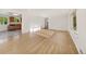 Bright living room boasting gleaming hardwood floors and large windows for natural light at 12682 Anhawa Ave, Longmont, CO 80503