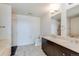 Modern bathroom with double vanity and shower at 2001 Lincoln St # 1024, Denver, CO 80202