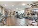 Modern gym with cardio and strength training equipment at 2001 Lincoln St # 1024, Denver, CO 80202