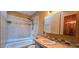 Bathroom featuring tile shower and updated vanity at 18170 Forest View Rd, Monument, CO 80132