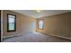 Neutral bedroom with baseboard heating and natural light creates an inviting atmosphere at 18170 Forest View Rd, Monument, CO 80132