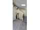 Open entryway with high ceilings and staircase at 18170 Forest View Rd, Monument, CO 80132