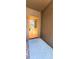 Charming home featuring a wooden front door with glass panel, set in a brown-paneled entryway at 18170 Forest View Rd, Monument, CO 80132