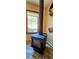 Cozy wood stove features a view of outside through a window at 18170 Forest View Rd, Monument, CO 80132