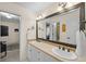 Bathroom featuring double sinks and oversized mirror at 237 Lead King Dr, Castle Rock, CO 80108