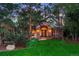 Charming brick home with lush green lawn, landscaped garden beds, and an inviting front entrance at 237 Lead King Dr, Castle Rock, CO 80108