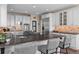 Modern kitchen with granite countertops, stainless steel appliances, and ample cabinet space at 237 Lead King Dr, Castle Rock, CO 80108