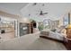 Bright main bedroom with vaulted ceilings, fireplace, and large windows at 237 Lead King Dr, Castle Rock, CO 80108