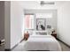 Clean and spacious bedroom with a queen bed and plenty of natural light at 2820 W 26Th Ave # 101, Denver, CO 80211