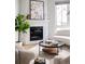 Modern corner fireplace with white stone surround at 2820 W 26Th Ave # 101, Denver, CO 80211
