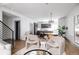 Open concept living area with kitchen view at 2820 W 26Th Ave # 101, Denver, CO 80211
