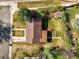 Aerial view of a home featuring a fenced backyard and mature trees at 3061 S Mabry Ct, Denver, CO 80236