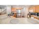 Open kitchen featuring stainless steel appliances, tile backsplash, and a breakfast bar at 6210 Wescroft Ave, Castle Rock, CO 80104
