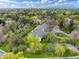 Beautiful aerial view of home nestled within a tree-lined neighborhood at 4800 S Franklin St, Cherry Hills Village, CO 80113