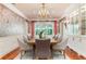 Charming dining room with hardwood floors, custom cabinets, and a chandelier at 4800 S Franklin St, Cherry Hills Village, CO 80113