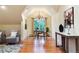 Bright and airy home office area with hardwood floors and an elegant chandelier at 4800 S Franklin St, Cherry Hills Village, CO 80113