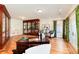 Bright home office with rich wood floors, built-in display case and desk, and designer touches throughout at 4800 S Franklin St, Cherry Hills Village, CO 80113