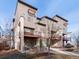 Well-maintained modern townhome showcasing architectural design and inviting outdoor living spaces at 8855 E 55Th Ave, Denver, CO 80238