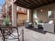 Cozy outdoor patio featuring comfortable seating, a stylish rug, and inviting decor at 8855 E 55Th Ave, Denver, CO 80238