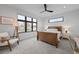 Cozy bedroom featuring a large window, natural light, and modern decor, creating a relaxing atmosphere at 1085 S Cook St, Denver, CO 80209
