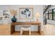 Elegant entryway featuring modern decor, a stylish desk, and natural light at 1085 S Cook St, Denver, CO 80209