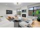 Bright living room with modern fireplace and contemporary furniture at 1085 S Cook St, Denver, CO 80209