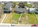 This aerial view shows a home with well-manicured lawn and proximity to neighborhood amenities at 1624 S Elizabeth St, Denver, CO 80210