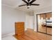 Bedroom showcasing hardwood floors and large closet with mirrored doors at 404 S Grant St, Denver, CO 80209