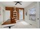 Bright home office featuring large windows, brick wall, and white shelving at 404 S Grant St, Denver, CO 80209