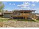 Backyard featuring a covered deck and patio for outdoor enjoyment at 219 Douglas Fir Ave, Castle Rock, CO 80104