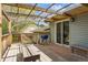 Enjoy outdoor living on this deck with wood pergola and sliding glass doors at 219 Douglas Fir Ave, Castle Rock, CO 80104