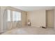 Bright living room featuring large window and neutral walls; offering a clean canvas for personalization and furnishing at 219 Douglas Fir Ave, Castle Rock, CO 80104