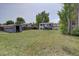 Large backyard with a shed, deck access and partial fence. Provides ample outdoor space at 5945 W 86Th Ave, Arvada, CO 80003