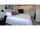 Comfortable bedroom featuring grey-painted walls, carpet, and framed art above the bed at 5945 W 86Th Ave, Arvada, CO 80003