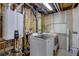 Laundry room featuring a modern washer and dryer at 5945 W 86Th Ave, Arvada, CO 80003
