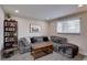 Comfortable living room with a large sectional couch and stylish decor at 5945 W 86Th Ave, Arvada, CO 80003