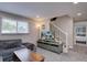Cozy living room with comfortable seating, a TV, and natural light at 5945 W 86Th Ave, Arvada, CO 80003