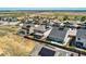 A great view of the home, backyard, neighborhood, and fenced backyard from an aerial perspective at 14551 Hudson St, Thornton, CO 80602