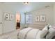 Charming bedroom features carpet, natural light and themed artwork for a delightful space at 14551 Hudson St, Thornton, CO 80602