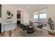 Modern dining room with contemporary table, chairs, and sliding glass door to deck at 14551 Hudson St, Thornton, CO 80602